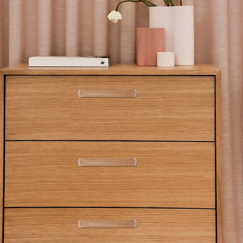 Wooden dresser with beech wood door pulls and drawer handles, showcasing 96mm lacquer finish, perfect for cabinets and DIY makeovers.