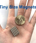Hand holding Tiny 3x2mm Magnets Set with coin for scale for 3D printing crafts miniatures and small models great for connecting figure joints