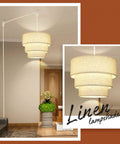 Plug In Pendant Light With Beige Linen 3-Tier Drum Shade, 15 Feet Hanging Lamp in cozy living room