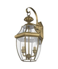 Monterey Two Light Outdoor Antique Brass Finish Solid Brass Wall Lantern With Clear Beveled Glass for traditional exterior lighting