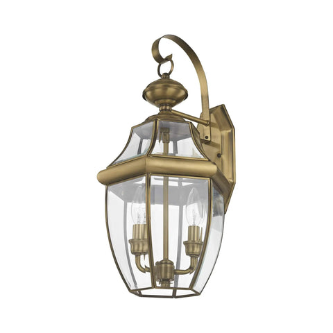 Monterey Two Light Outdoor Antique Brass Finish Solid Brass Wall Lantern With Clear Beveled Glass for traditional exterior lighting