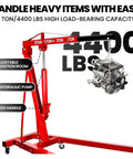 Heavy Duty Engine Hoist Leveler And Foldable Hydraulic Cherry Picker Crane Built Tough For Serious Garage Jobs That Handles Massive Engines Like A Dream Without Breaking A Sweat showing a 2 ton capacity red crane with adjustable boom lifting an engine.