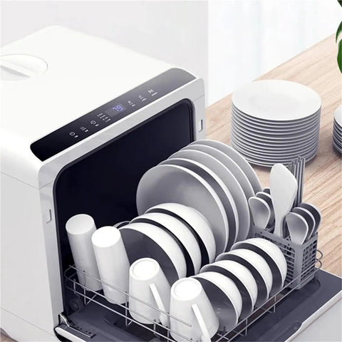 Hassle Free Portable Countertop Dishwasher With A Slick Compact Build Dead Simple To Run And Delivers High Efficiency Cleaning For Sparkling Dishes Daily, filled with clean white dishes and utensils.