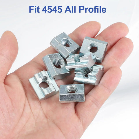 Hand holding eight Hardcore M10 Sliding T Nuts With A Rock Solid Hammer Head For Hassle Free Drop In Mounting On European 4545 Series.