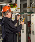 Technician using Industrial Electronics Multimeter Combo Kit With Probes And Hooks Six Piece DMM Set For Troubleshooting.