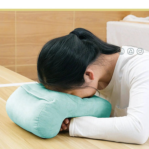 Person using Donut Desk Nap Pillow Cushion With Velvet Fabric, Soft Donut Shaped Pillow For Face Down Sleepers, Hollow Design For Neck Support