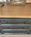 Close-up of cabinet with Black Zinc Alloy Cabinet Handles Set of 6, 12.6 Inch Center To Center Pulls, on ribbed drawer front.