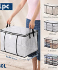 Giant Clear View Storage Bag For Blankets And Comforters Super Spacious Eighty Liter See Through Organizer For Winter Gear And Stuff Heavy Duty Zipper, view of clear storage bag with a person holding it.