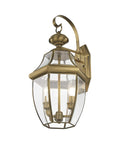 Monterey Two Light Outdoor Antique Brass Finish Solid Brass Wall Lantern with Clear Beveled Glass for classic lighting