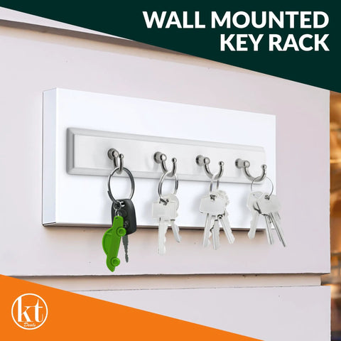 Wall Mounted Key Rack With Four Hooks, Steel And Wood Key Holder For Keys And Small Essentials in an outdoor setting