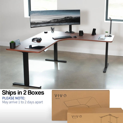 VIVO Corner Standing Desk In Dark Walnut L Shaped Electric Height Adjustable Workstation with dual monitors setup and accessories.