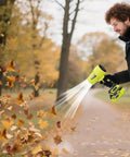 Person using Cordless Turbo Jet Leaf Blower for lawn debris, driveway sand, car drying, 450 CFM high speed operation outdoors