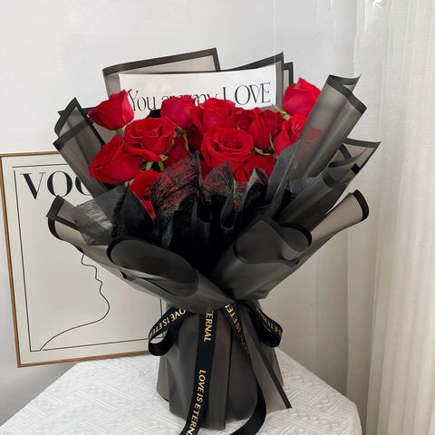 20 Sheets Black Flower Wrapping Paper With Black Border For Bouquets And DIY Craft Floral Gift Wrap 22.8 Inch Square Pack Great Florist Packaging Material For Fresh Flowers And Home Projects wrapping red roses in a vase.