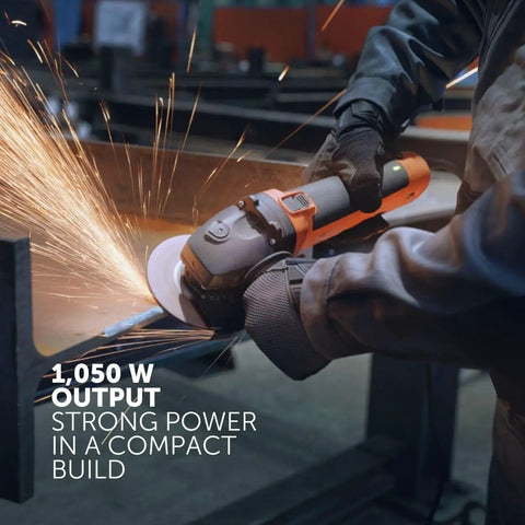 Professional Compact Angle Grinder With Anti Vibration Handle And Soft Start Module in use, creating sparks during grinding.