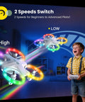 Beginners Drone For Kids With 3 Batteries And Easy Flight Modes HS180 showing two speed modes, colorful LED lights in a room.