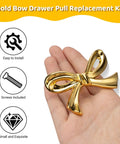 Gold Bow Drawer Knobs Set 8 Pcs in hand, showing sturdy gold bow design for dresser, desk, wardrobe, TV stand, and bookcase.