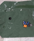 Foldable Water Storage Bladder With Faucet 110L Portable Camp Ready Collapsible Water Tank, green PVC material, connectors visible
