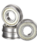 FR8ZZ Flanged Ball Bearing One Half Inch Bore One And One Eighth Inch Outer Diameter Five Sixteenth Inch Width Double Shielded Deep Groove Chrome Steel GCr15 Pre Lubricated Miniature Bearings Four Pack ABEC1 flanged bearings stacked on white