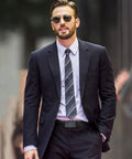 Man in a business suit wearing a Dope Mens Leather Belt Ratchet Black Dress Belt With Automatic Slide Buckle For Men Easy Adjustable Everyday Wear For Jeans Business Attire And Gift For Him Great Value.