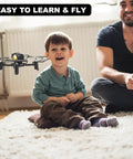 Child enjoying DIY Mini Drone Kit For Kids And Beginners Build Your Own RC Quadcopter With Altitude Hold Headless Mode Indoor Outdoor STEM Learning And Early Flight Courses Ideal For Bulk Educational Orders