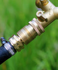 Solid Brass Garden Hose Quick Connect Kit Three Quarter Inch GHT Threaded Fittings No Leak Female And Male Adapters attached to hose