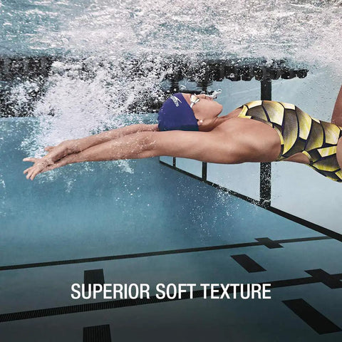 Swimmer underwater wearing Go-To Unisex Silicone Swim Cap For Adults, No-Snag, Stretchy, Hair-Friendly Cap That Protects Hair From Chlorine.