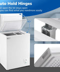 Compact Deep Chest Freezer Featuring 3.5 Cu Ft Capacity And Durable Storage Baskets White showing auto hold hinges and open lid.