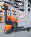 Heavy Duty Tory 3300 Lb Full Electric Pallet Jack With Long Battery Life in a warehouse, showcasing multifunction handle and robust design.