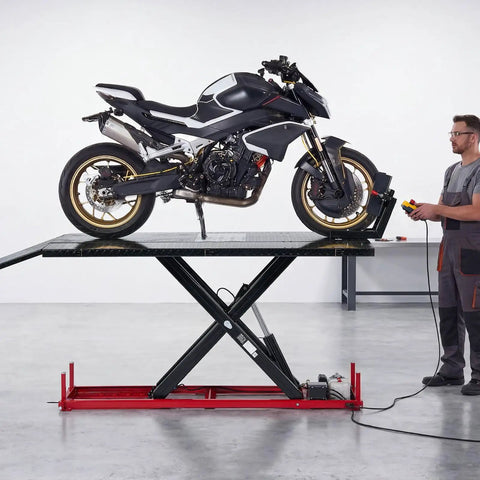 VEVOR Motorcycle Lift Table, 1500 Lb Electric Hydraulic Scissor Jack with a motorcycle on a raised platform in a workshop.