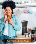 Woman in kitchen with Four Pack Reusable Coffee Filters With Handle For Eight To Twelve Cup Mr Coffee And Black Decker Coffee Makers.