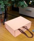 Dope Space Saving Foldable Gift Box For Clothes And Shoes With Adhesive Sticker Portable Flat Folding Design on wooden floor