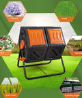Rotating Dual Chamber Compost Bin With Tumbling Design And Sliding Doors For No Fuss Mixing, Garden Compost Tumbler With Aeration System, BPA Free, 31 Gallon Capacity, Orange Color Perfect For Yard Waste And Kitchen Scraps displayed in garden setting.