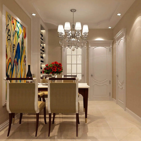 Dining room with elegant chandelier, art on wall, and chairs, lit by GU10 LED Bulbs 4W Non Dimmable 400 Lumens 2700K Warm White.