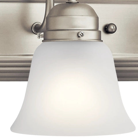 Close-up of Brushed Nickel 5 Light Vanity Bath Light With Clear Satin Etched Glass Dope Modern 36 Inch Wall Mount Fixture.