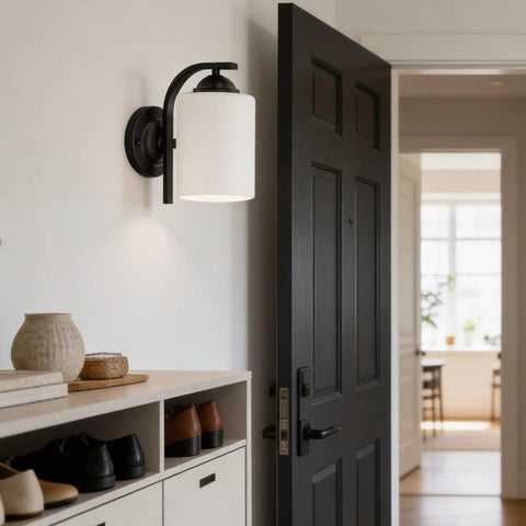 Top Tier Modern Farmhouse Wall Sconces With Solid Matte Black Frame And Soft Diffused Glass Shade Hardwired Vanity Light Fixture on entryway wall.