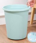 Stainless Steel Furniture Roller With Adhesive Sliders For Heavy Load Moving Washer Dryer Machine And Couch Glide Home Essentials near a light blue trash bin.