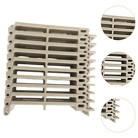 Heavy Duty Desktop Cable Organizer With Server Rack Tray Clips And Sturdy Wire Holder To Ditch Cord Chaos and keep your workspace slick and straight up organized, featuring stacked gray plastic clips.