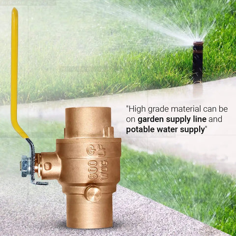 Premium Full Port Brass Ball Valve With Drain 3/4 In SWT X 3/4 In SWT shown outdoors near a garden sprinkler