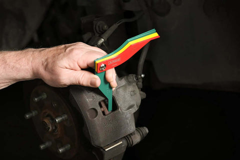 Using 8 Piece Metal Brake Gauge Tool Set for Sheet Metal, 20 Gauge on brake lining, color-coded gauge measures thickness, SAE/Metric.