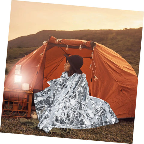 Person using Go-To 6-Piece Survival Emergency Blanket Set With Gold And Silver Reflective Foil, Portable Thermal Blankets for camping.