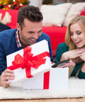 Heavy Duty Cordless Electric Scissors With Fast Usb Rechargeable Power And Self Sharpening Steel Blades For Slick Cuts Through Denim Fabric Leather Carpet And Stubborn Cardboard In Nifty Pink shown being unboxed by a couple.