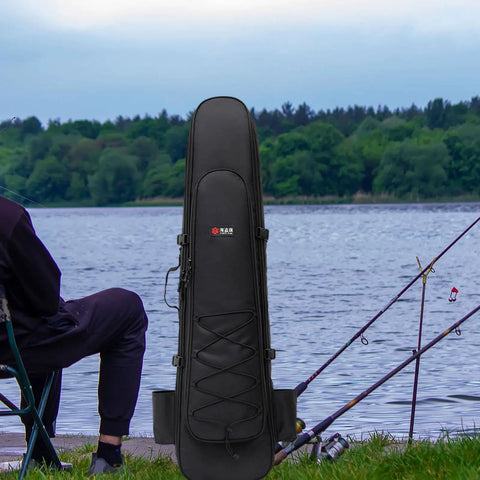 Long Fins Bag For Scuba Gear And Snorkel Kit next to a lake with fishing rods, showing wet dry separation feature.