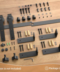 7.5 Foot Ceiling Mount Sliding Barn Door Hardware Kit Black With Low Ceiling L Shape Bracket System, parts on wooden surface
