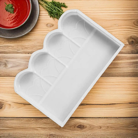 White plastic Fence Concrete Mold For DIY Projects, Garden Brick Mold, on wooden table for patio paving and walkways.