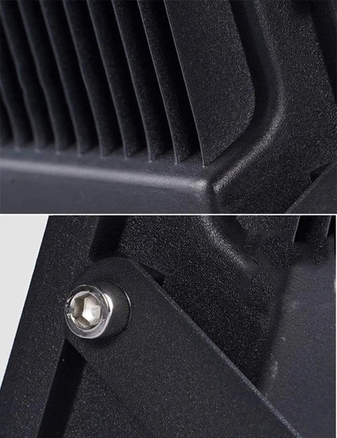Close-up of JUDYSSY Solar Flood Lights Led Solar Floodlight's die-cast aluminum housing, showcasing heat dissipation fins.