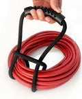 Heavy Duty Nylon Cord Strap Organizer Rope For Tailgate Parties And Campouts Holds Generator Cords Tight shown in use, neatly coiled with a handle.