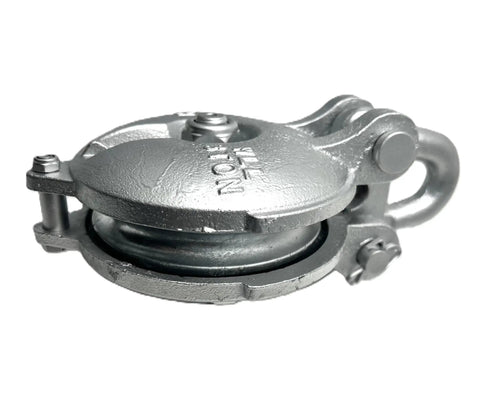 Heavy Duty Yarding Block With Shackle And Pin Three Ton WLL Four Inch Sheave Silver Painted Rig Block For Log Hauling Built Tough With Grease Zerk And Three Eighths Inch Cable, side view