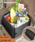 Premium Dual Purpose Car Seat Storage Box With Built In Lumbar Support Cushion For Tesla Cybertruck filled with groceries in vehicle.