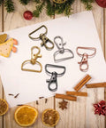 Kickass Swivel Clasp Hooks For Key Chains And Lanyards, D Ring Snap Clips for purse hardware, solid 3/4 inch, in multiple colors.