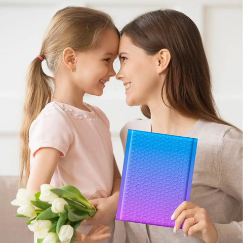 Must Have Cute Design Bubble Mailers 6x10 Inch 100 Pack Opaque Padded Envelopes with blue purple design in woman's hand